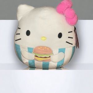 Hello Kitty Squishmallow holding a Hamburger